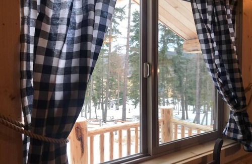Kila Cabin | Deer Cabin at +WM Ranch Near Glacier National Park, Peaceful log cabin in the woods, yet only 20 min.