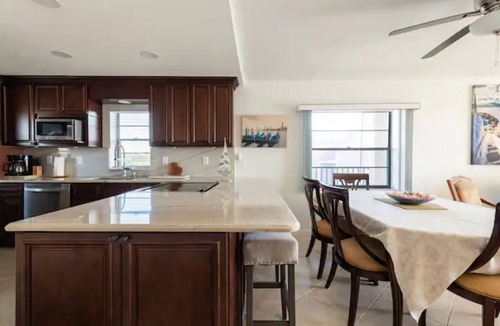 Port Canaveral Condo | Direct River gorgeous view! Newly remodeled, quartzite counter open floor plan