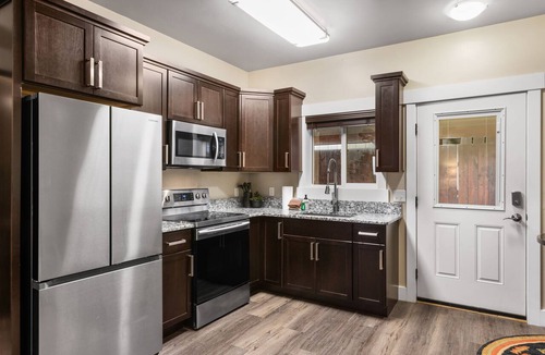 West Yellowstone Apartment | Discover The Yellowstone Hideaway Unit C, a cozy 2-bed retreat just 1 minute from Yellowstone!