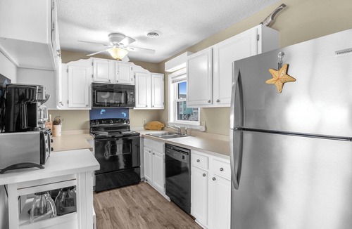 Long Beach House | Divine Intervention: Oceanfront beach home with luxury vinyl plank flooring