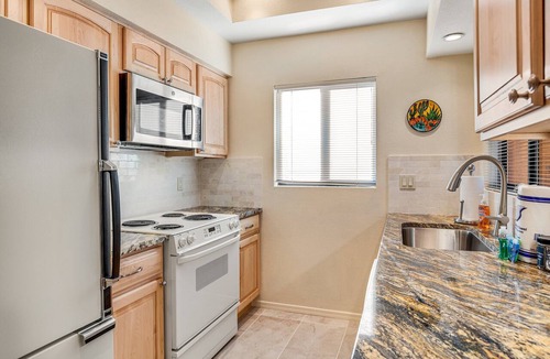 Skyline Bel Air Estates Condo | Dog-friendly, ground-floor condo with mountain view, fireplace, pool & hot tub