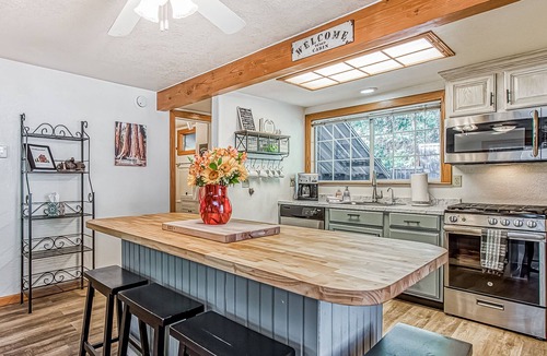 West Village House | Dog-friendly home with covered deck, fireplace, washer/dryer, & ping-pong table