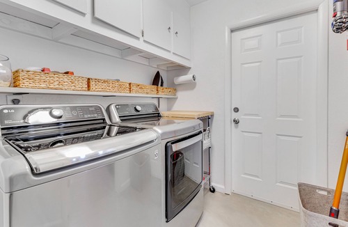 Casas Adobes West House | Dog-friendly modern stay with a heated private pool, sun room, & grill