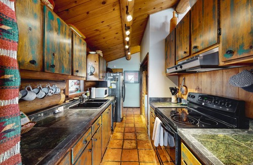 Jackson Cabin | Dog-friendly waterfront cabin on Flat Creek with wood stove, creek view, firepit