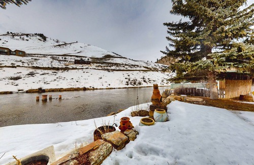 Jackson Cabin | Dog-friendly waterfront cabin on Flat Creek with wood stove, creek view, firepit