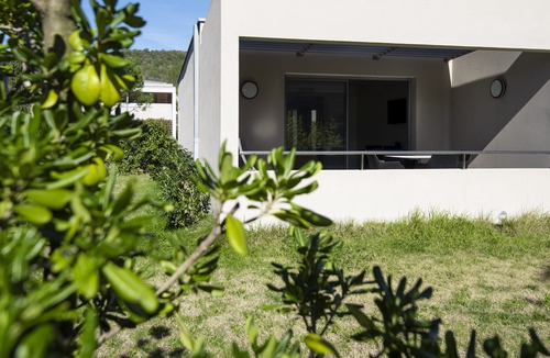 Santa Giulia House | Duplex apartment with private patio Santa Giulia