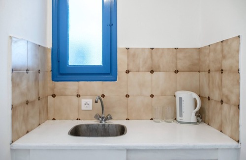 Perissa Apartment | Economy Quadruple Room 1 with Balcony and Air Conditioning