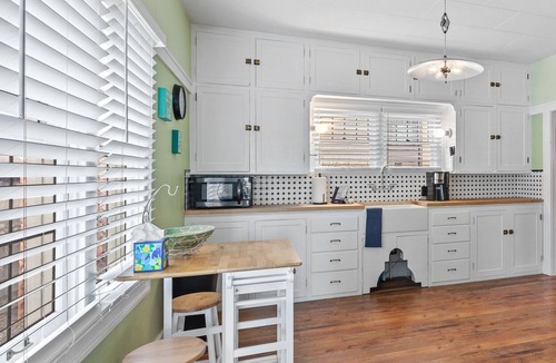 Garden District House | Elegant Historic Home in Modernized Area—Blocks from Downtown, with Cozy Fire Pit for Relaxation!