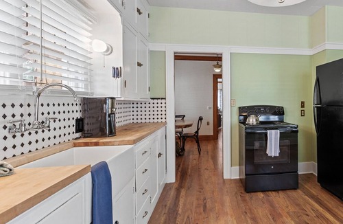 Garden District House | Elegant Historic Home in Modernized Area—Blocks from Downtown, with Cozy Fire Pit for Relaxation!