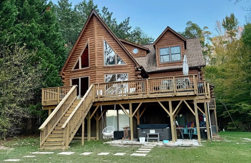 Bumpass House | Enchanting 5-Bed/5-Bath Lakefront Log Cabin with Private Cove, Beach & Hot Tub.
