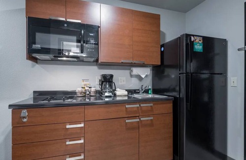 Meridian Hotel | Enjoy Comfort in Pet-Friendly Room with Full Kitchen - Great Location