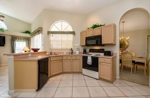 Sunridge Woods Villa | Executive waterfront 4 bed 3 bath, south facing private pool and covered lanai