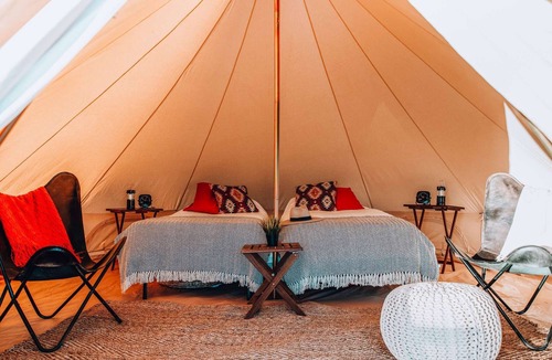 Tropic House | Family Tent w/Shared Bathroom - Beauty awaits you just past the red cliffs.