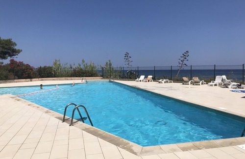 Santa-Lucia-di-Moriani Condo | Feet in the water, sea and pool