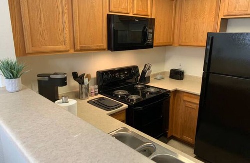 Downtown Condo | Gated, Private, Safe, Clean Upstairs Condo-Pool & Gym!