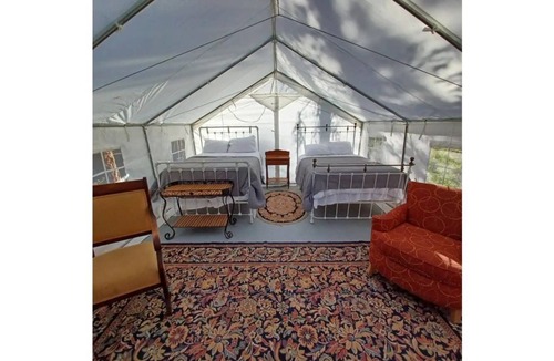 Olney RV Rental | Glamping Wall Tent 8/ 2 Queens