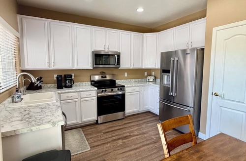 Coldwater Springs House | Gorgeous 4-bedroom house with heated spa/pool!