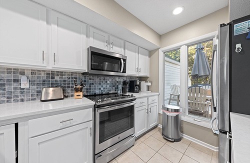 Spinnaker Beachhouses Villa | Great Spinnaker! Quiet Location w/Golf/Lagoon Views! Amenity access included!