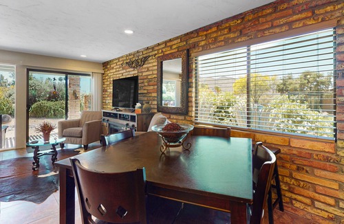 Carefree Condo | Ground-floor condo with on-site pool, grills, patio, & central AC