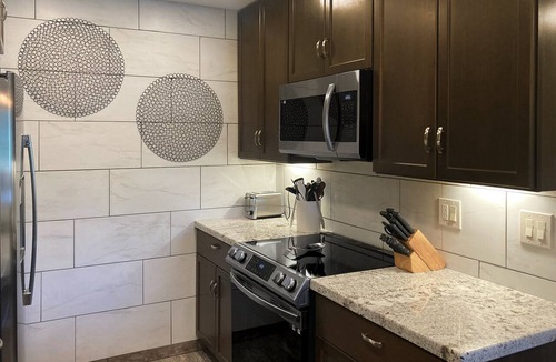 Carefree Condo | Ground-floor condo with on-site pool, grills, patio, & central AC