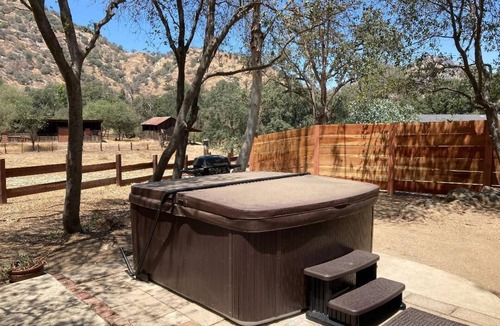 Three Rivers Cottage | Guest House with Private Hot Tub, Shared Pool, and Walk to Town