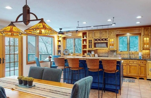 Hayden View Estates House | Hilltop Lodge on Hayden Lake | Expansive deck & private dock with stunning views