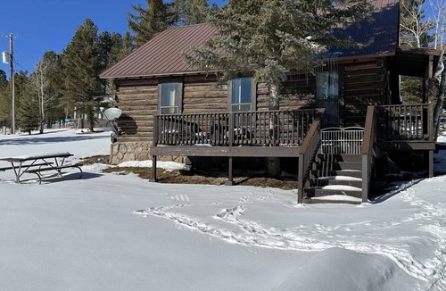 Greer Cabin | Historic Log Cabin in Greer, AZ. Located near Molly Butler's & Sunrise Ski Area
