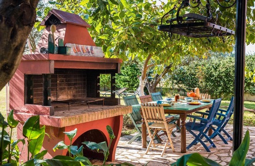 Agios Matthaios House | Idyllically situated and luxurious villa with a veranda and a gazebo