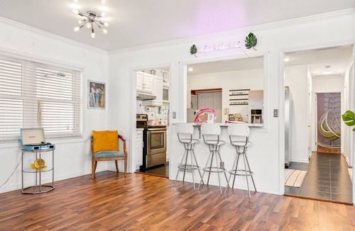 Mapleton/Fall Creek House | Indy's Palm Pad | Deck Retro Tiki Bar Parking