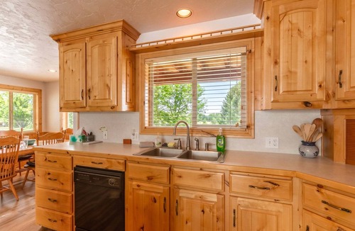St. Anthony Cabin | KABINO: Riverfront on Henrys Fork A/C Boat Launch Foosball Pool Table Huge Yard Garage WIFI