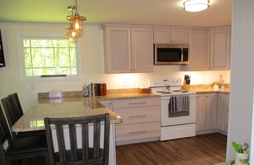 Kelleys Island House | "Kelleys Island Escape" is a short walk from downtown Kelleys Island & sleeps 6.