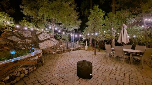 Bass Lake House | Knotty Pine Cabin with Artisan Stone Patio - Walk to Bass Lake