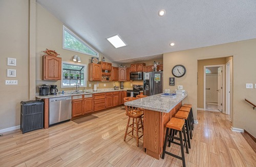 Bumpass House | Lakefront family home in gated community with swimming area & dock - dogs OK