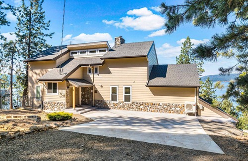 Worley House | Lakefront home with tram, dock and water access