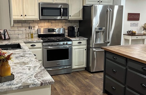 Rigby House | Large 4-bedroom 3-bath single level home with spacious greatroom and dining area