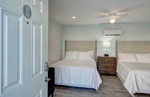 Surf City Hotel | Loggerhead Inn & Suites - Two Queen Suite in hotel in Surf City, North Carolina