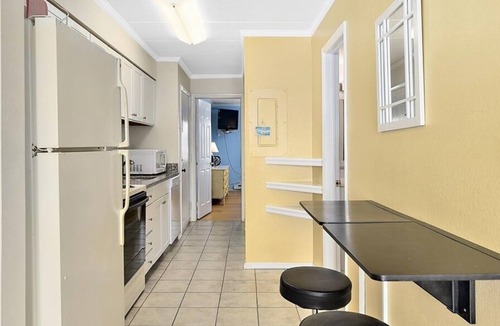 Midtown Ocean City Condo | Lovely 1-bedroom condo with free WiFi, cute coastal decor, and an outdoor pool located midtown and just steps to the beach!