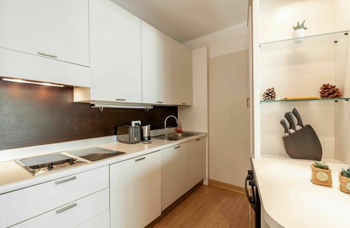 Santa Giulia Apartment | Lovely apartment for 4 people with WIFI, pool, A/C, TV and patio