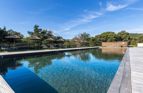 Santa Giulia Apartment | Lovely apartment for 4 people with WIFI, pool, A/C, TV and patio