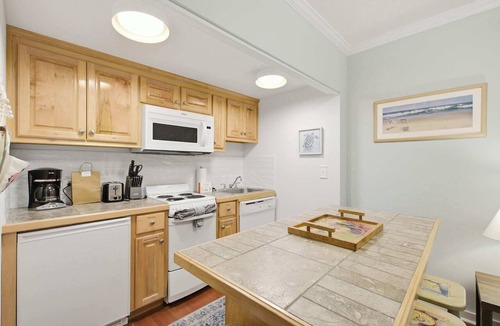 West Beach Village House | Lovely condo with free WiFi & shared tennis courts - close to golf & beaches