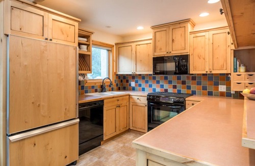 Warm Springs House | Luxurious Townhome Steps from Warm Springs with Private Hot Tub, and Firepit