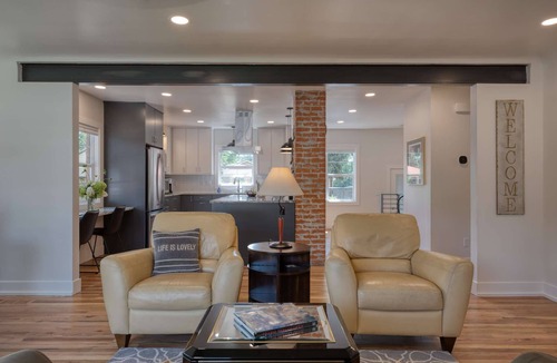 Collister House | Luxury at its Finest | Indulge in Gourmet Kitchen, Spacious Dining Area, & Plush Beds
