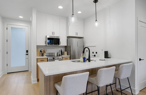 Mississippi District House | M Avenue House, steps from shops, dining, and arts