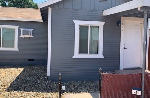 Bakersfield House | Master Bedroom with shared Bathroom