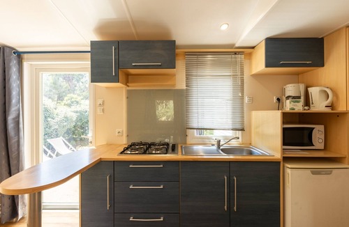 Palasca House | Mobile Home 'Village Camping De L'Ostriconi 28' with Sea View, Shared Pool and Wi-Fi