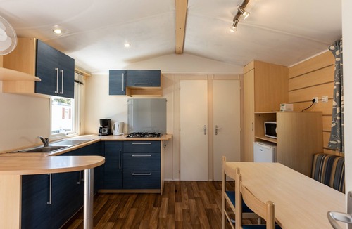 Palasca House | Mobile Home “Village Camping De L'ostriconi 24” with Sea View, Shared Pool, and Wi-Fi