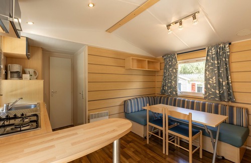 Palasca House | Mobile Home 'Village Camping De L'ostriconi 27' with Sea View, Shared Pool and Wi-Fi