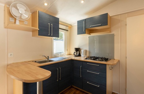 Palasca House | Mobile Home “Village Camping De L'ostriconi 21” with Sea View, Shared Pool and Wi-Fi