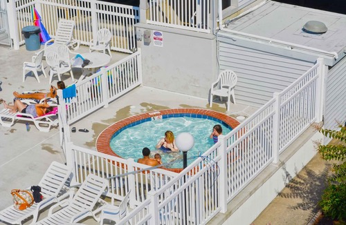 Midtown Ocean City Condo | Modern, stylish 2-bedroom luxury condo with free WiFi and an outdoor pool located midtown and only one block from the beach!