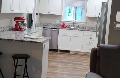 Price House | Nana's Place is a beautiful family, pet-friendly home with a fenced back yard.